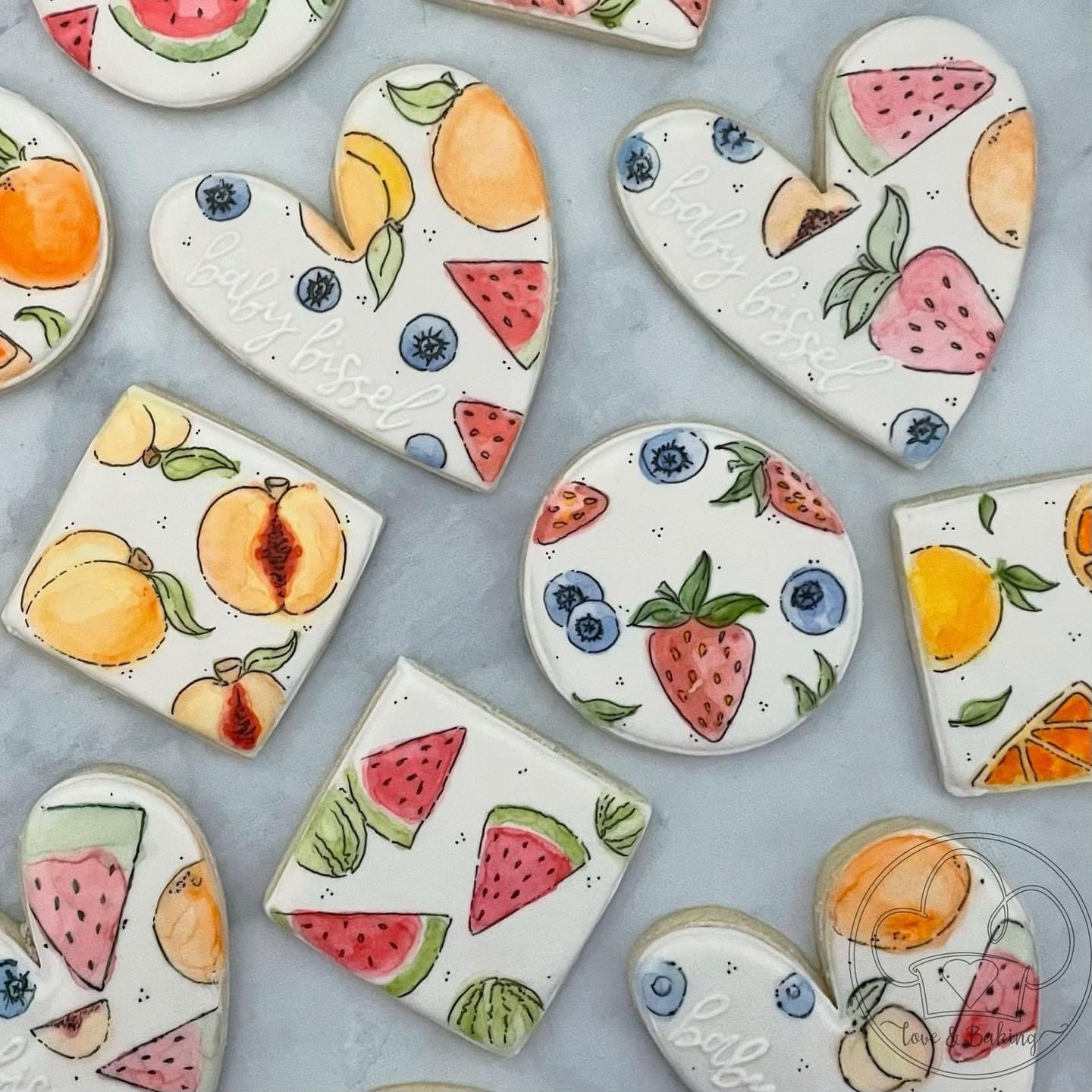 Assorted fruit-themed ceramic coasters with strawberries, peaches, watermelons, and blueberries on a light background.